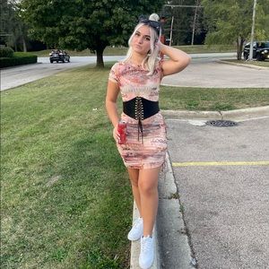 Foreign sheer dress (belt not included). Size small. Great condition.